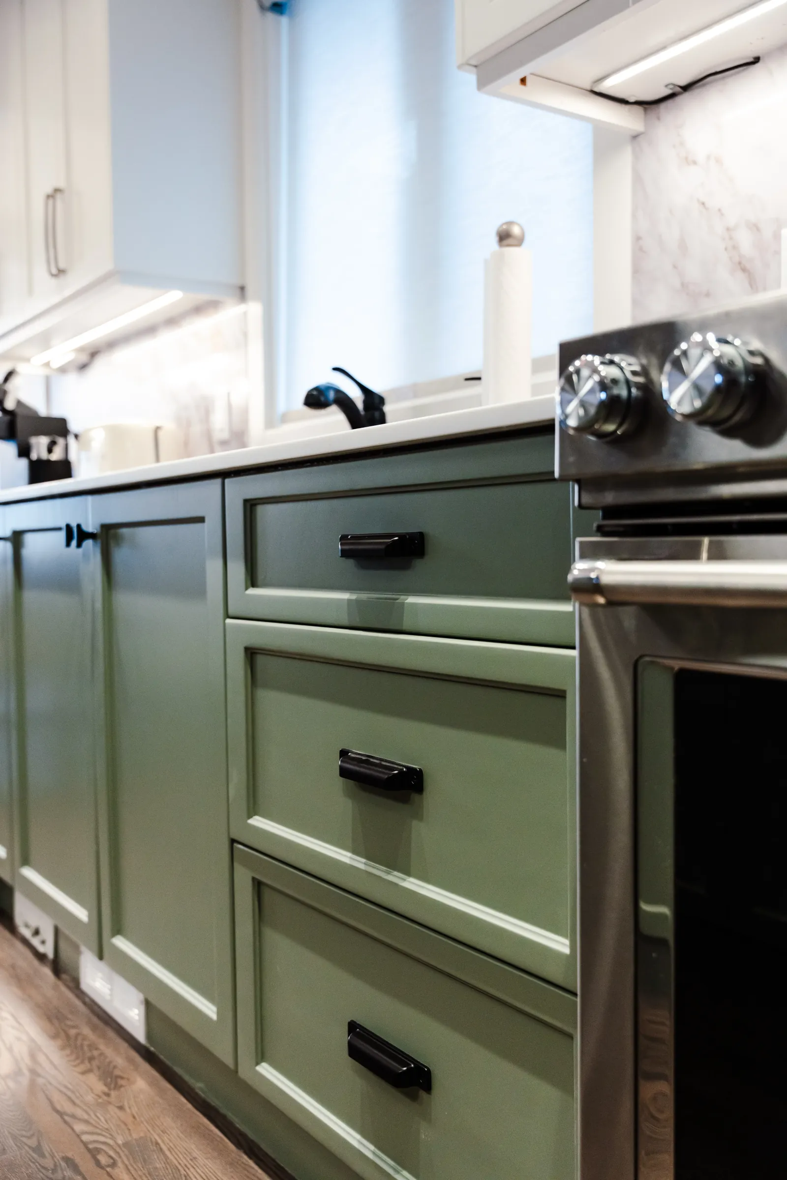 Custom green cabinetry and kitchen millwork in a Calgary kitchen renovation