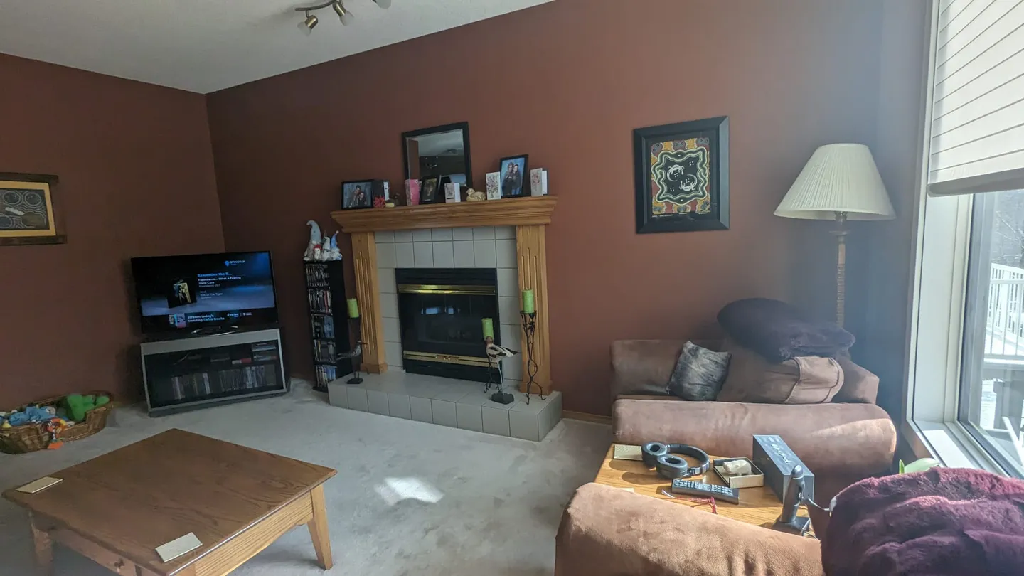 Living room before the complete home renovation in Valley Ridge Calgary NW