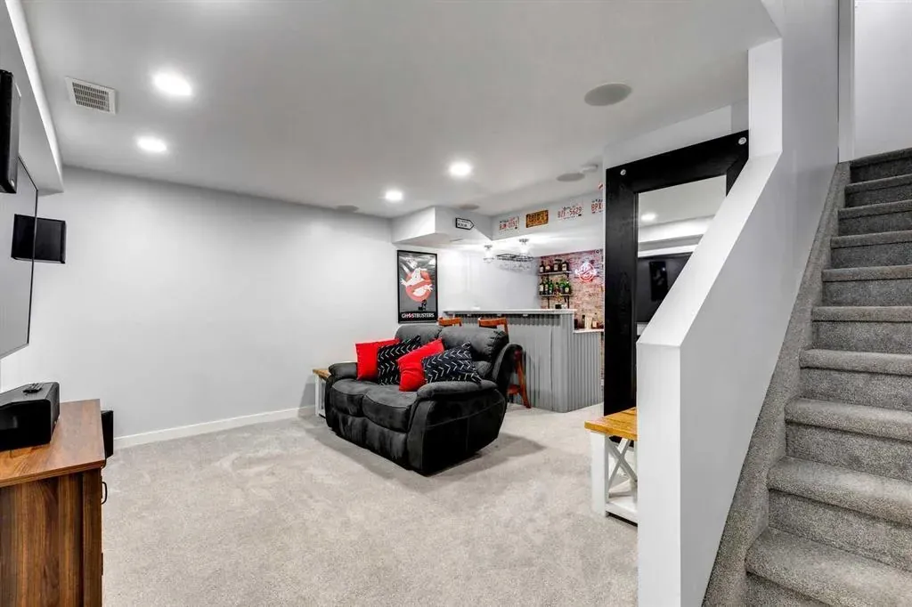 Plush textures softening a cozy basement family room renovation