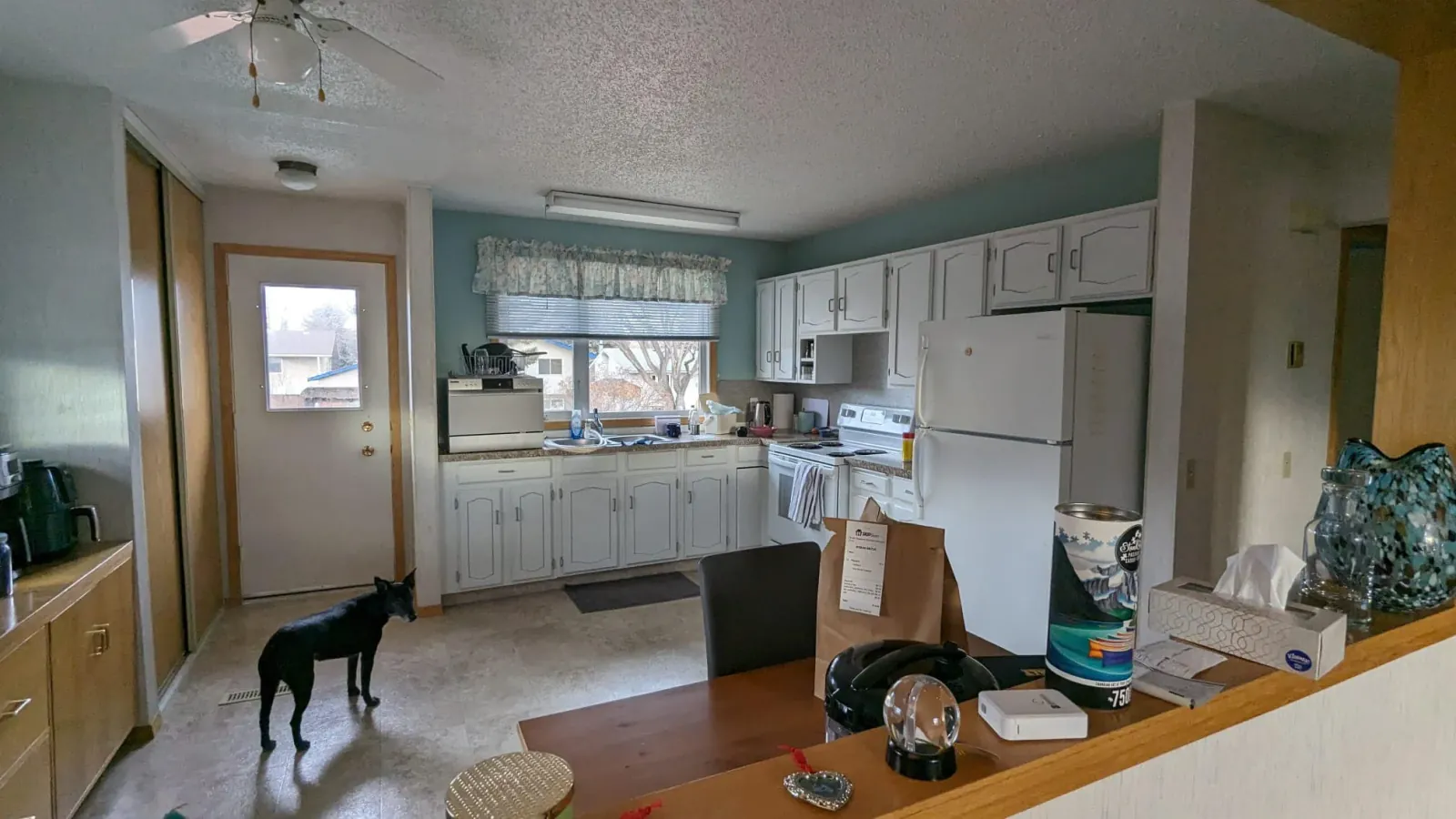 Dated kitchen before renovation in a Calgary home